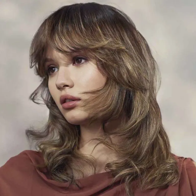 Softly Layered Kitty Cut with Face-Framing Flow