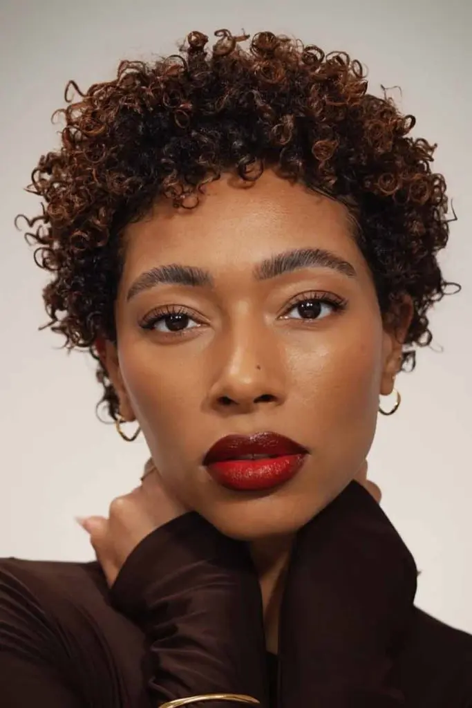 Elegant Curly Pixie with Golden Accents