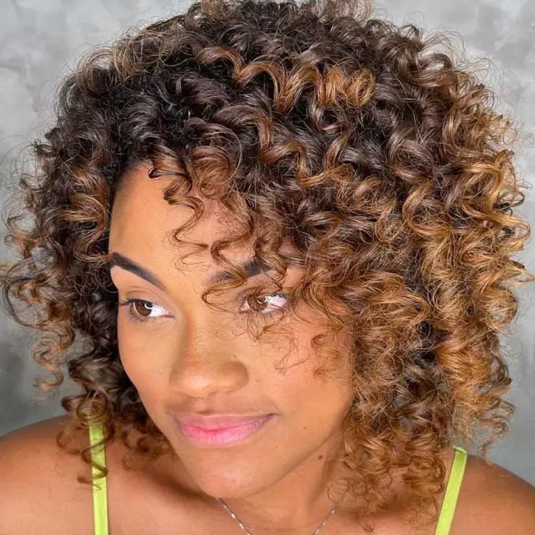 Radiant Caramel Curls with a Sunlit Glow
